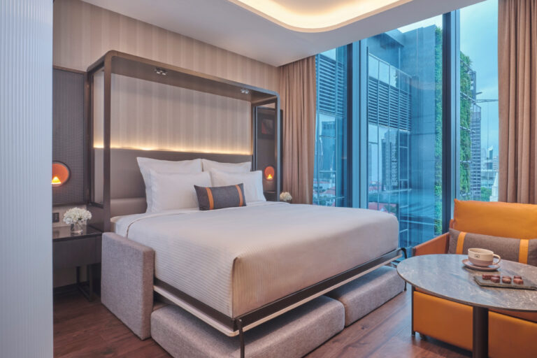 a view of a guestroom with a deluxe murphy bed at Pullman Singapore Hill Street source accor